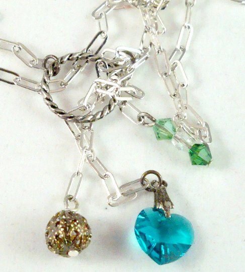 Silver lariat style necklace: blue, green, pink, yellow