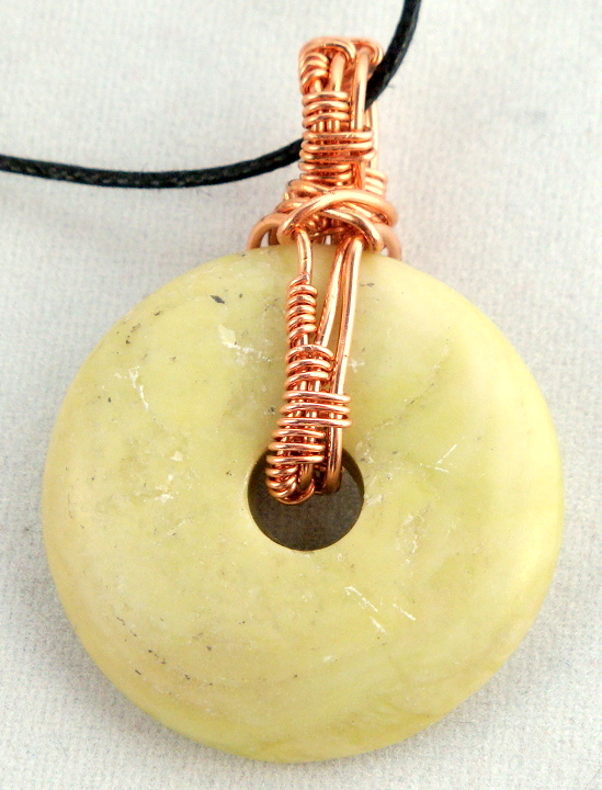 Stone donut pendent wrapped with copper 3