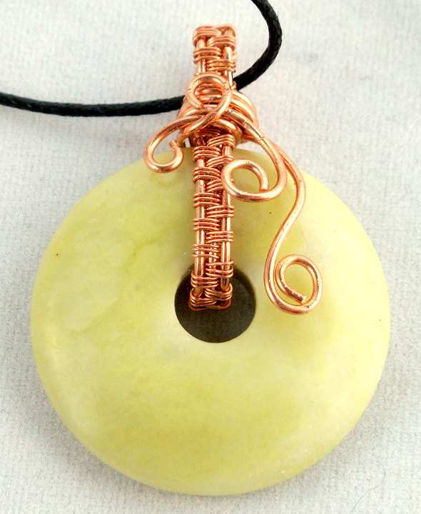 Stone donut pendent wrapped with copper 4
