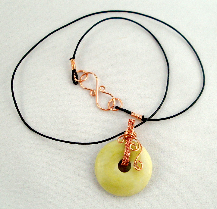 Stone donut pendent wrapped with copper 4