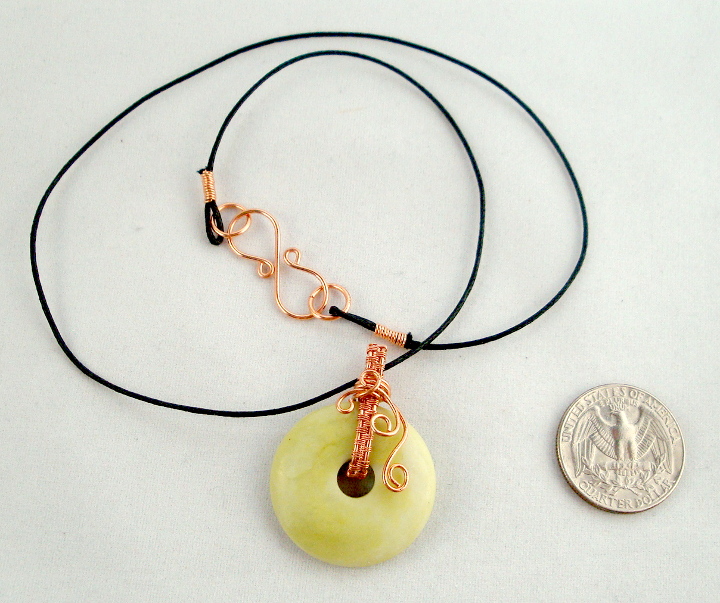 Stone donut pendent wrapped with copper 4