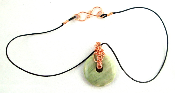 Stone donut pendent wrapped with copper 5
