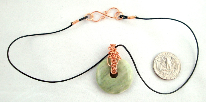 Stone donut pendent wrapped with copper 5