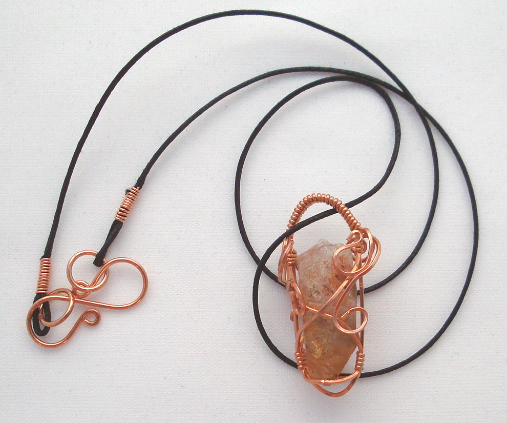 Quartz crystal wrapped with copper wire