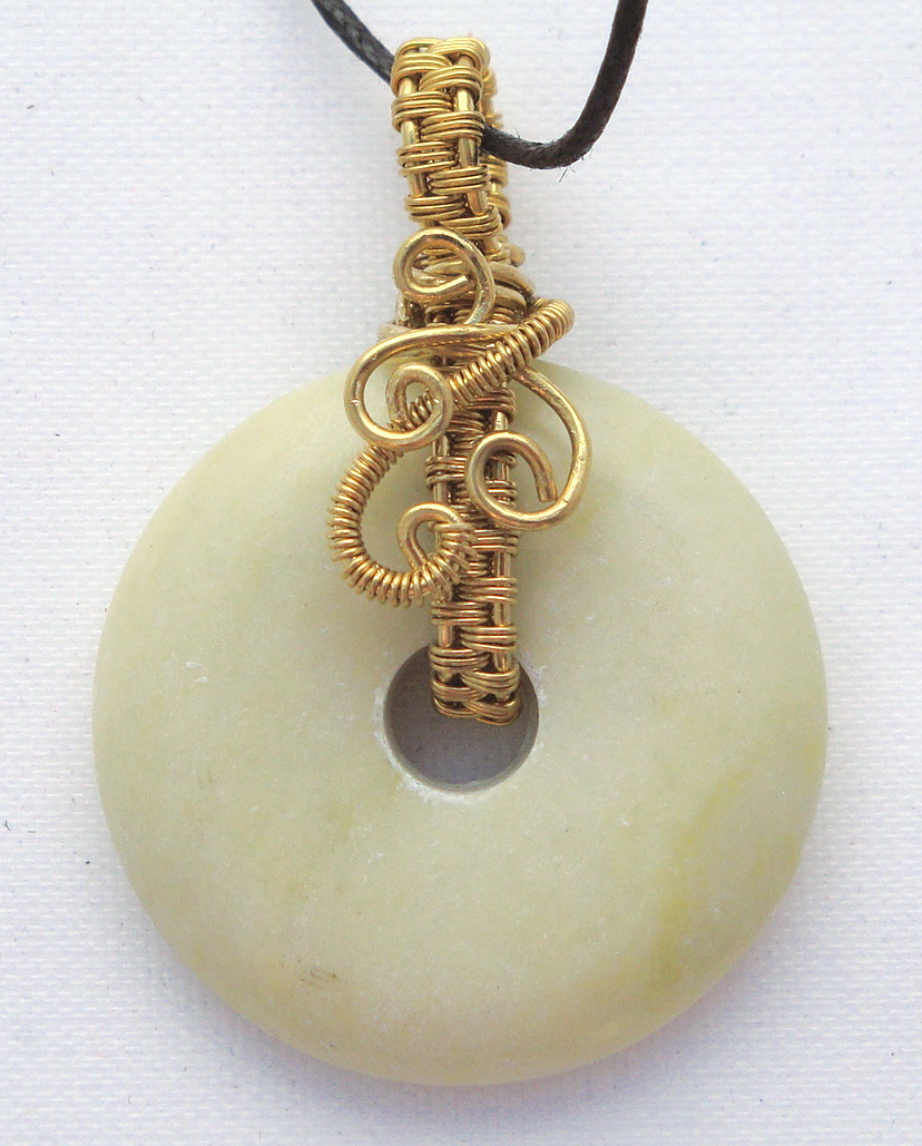 Stone donut pendent wrapped with bronze 2