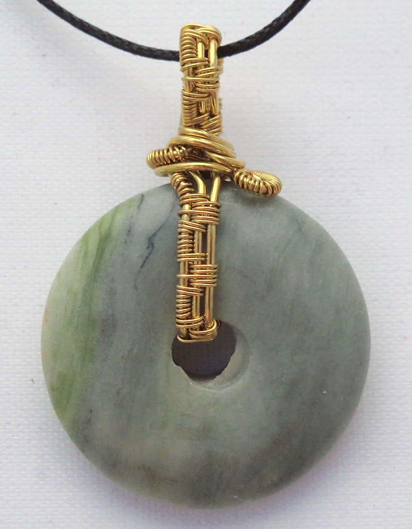 Stone donut pendent wrapped with bronze 3