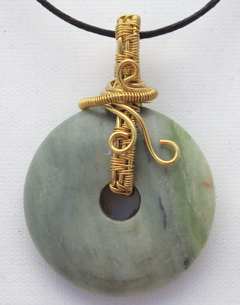 Stone donut pendent wrapped with bronze 3