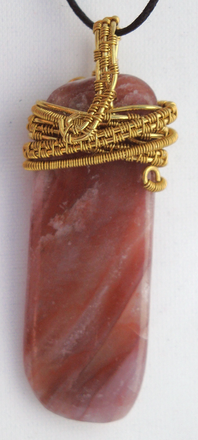 Pink striped stone wrapped with bronze wire