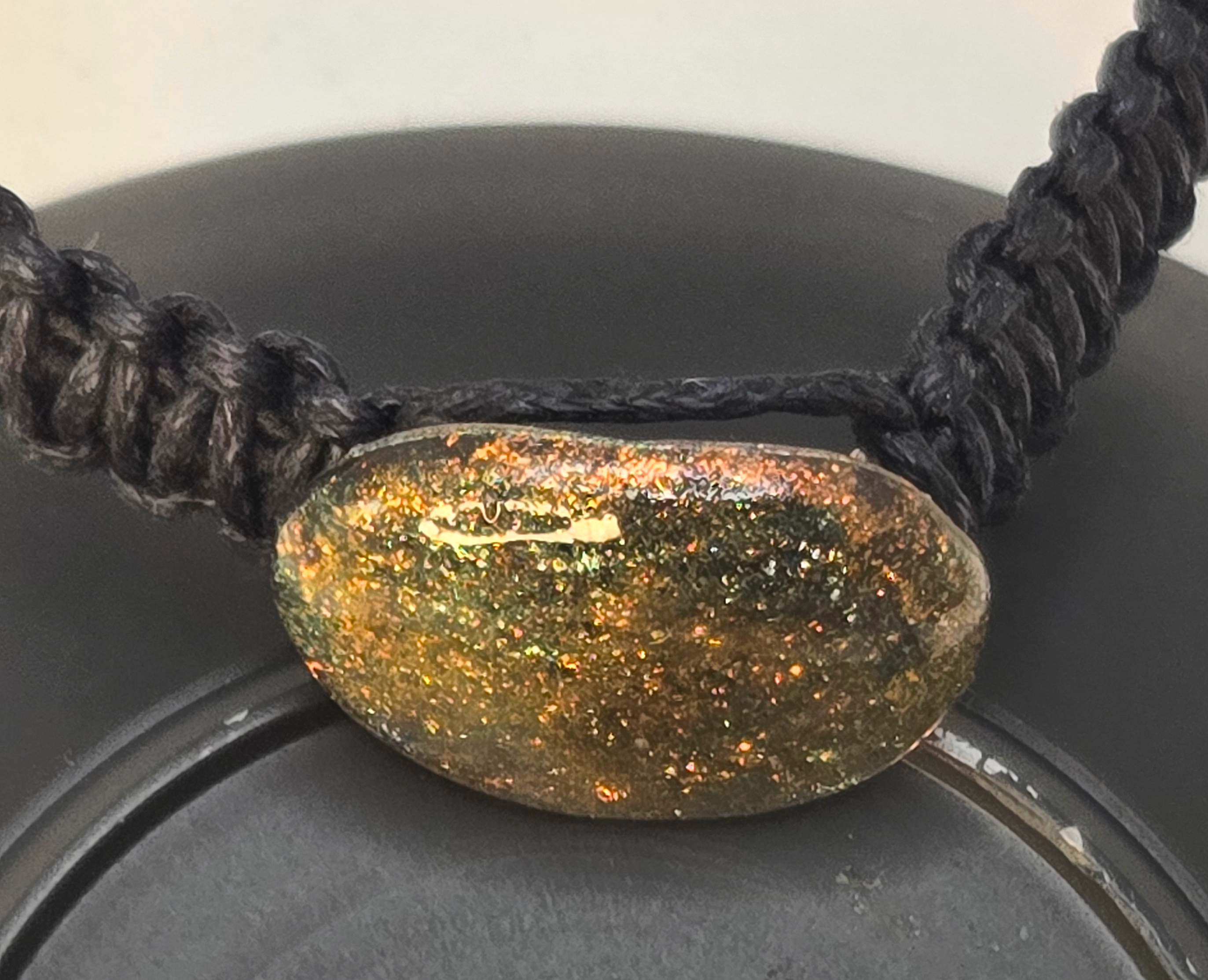 Macrame bracelet with a resin charm