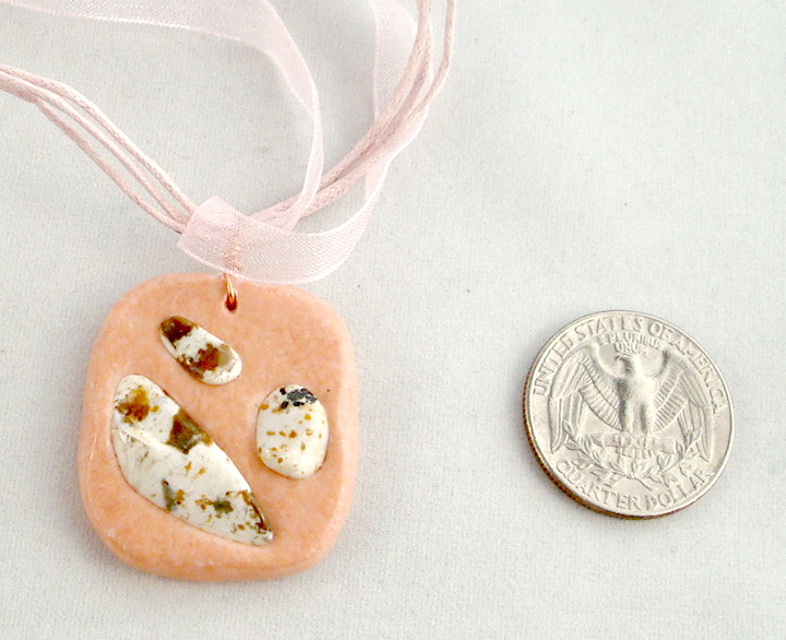 Pink clay pendant 1 3/8 long
