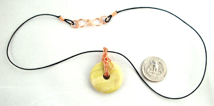 Stone donut pendent wrapped with copper 3