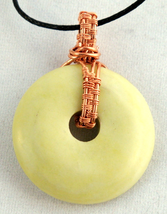 Stone donut pendent wrapped with copper 4