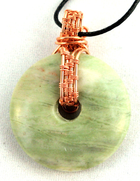 Stone donut pendent wrapped with copper 5
