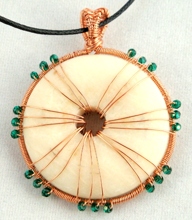 Stone donut pendent wrapped with copper and crystals 2