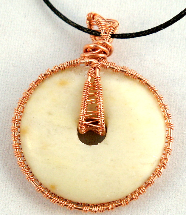 Stone donut pendent wrapped with copper 6