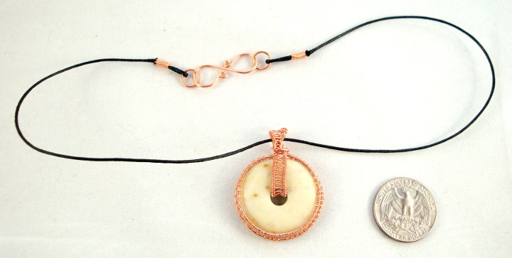 Stone donut pendent wrapped with copper 6
