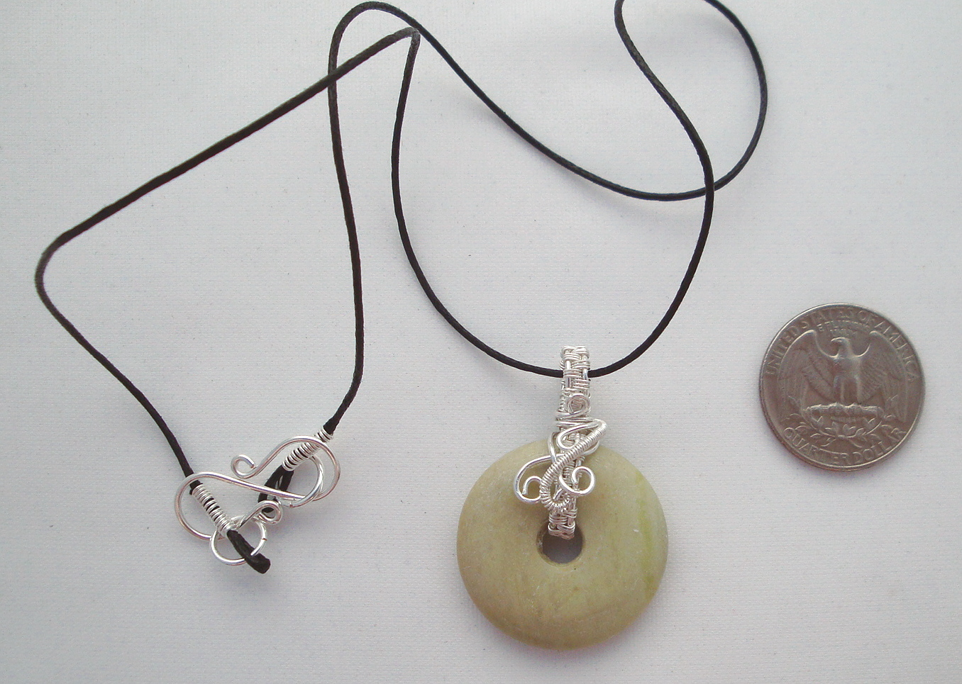 Stone donut pendent wrapped with silver 1