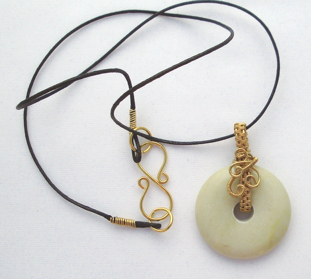 Stone donut pendent wrapped with bronze 2