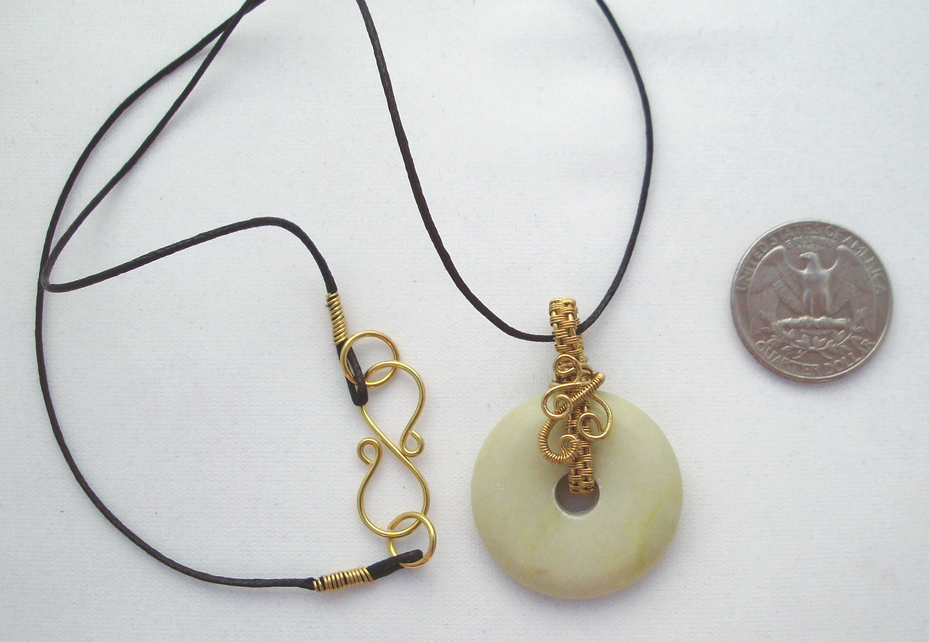 Stone donut pendent wrapped with bronze 2